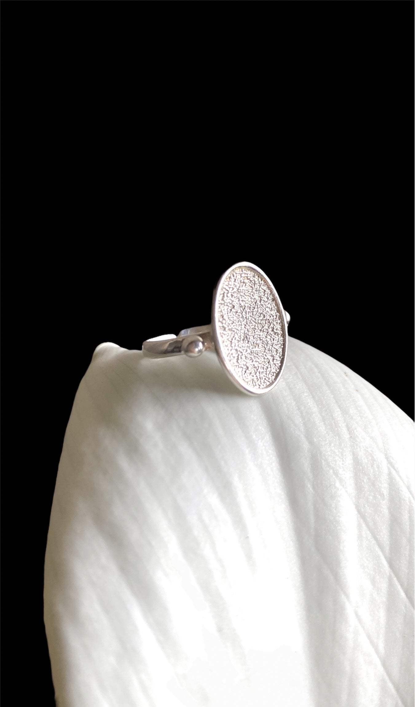 Oval-shaped ring